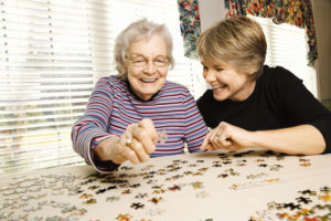 Home Care in West Hollywood_Senior Doing a Puzzle