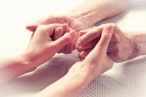 Caregiver Holding Hands - private caregiver jobs in beverly hills