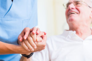 how does a senior with dementia pay for in-home or assisted living care